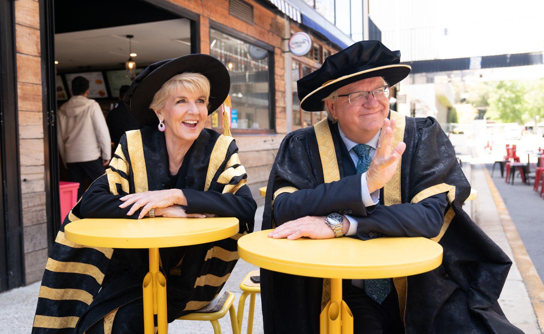 Brian Schmidt and ANU Chancellor Julie Bishop in graduation regalia