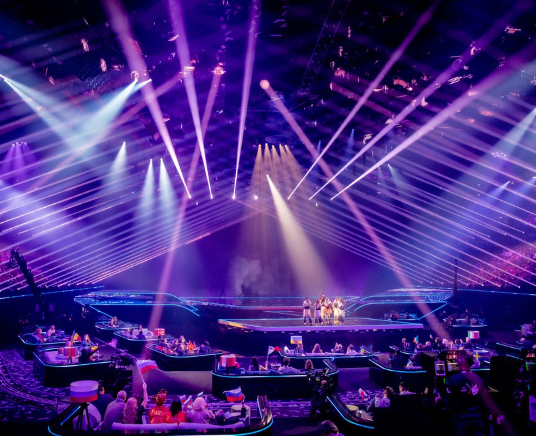 The stage at Eurovision, lit up with purple spotlights