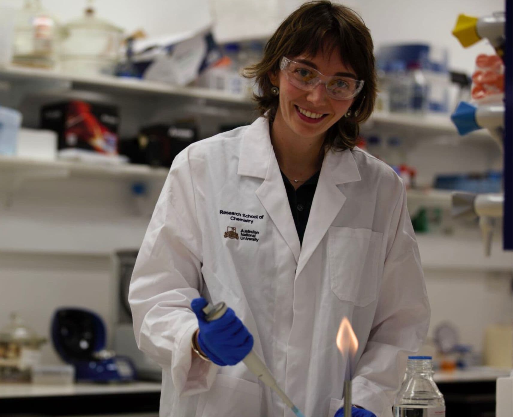 Rosie Georgelin in a lab coat, smiling.