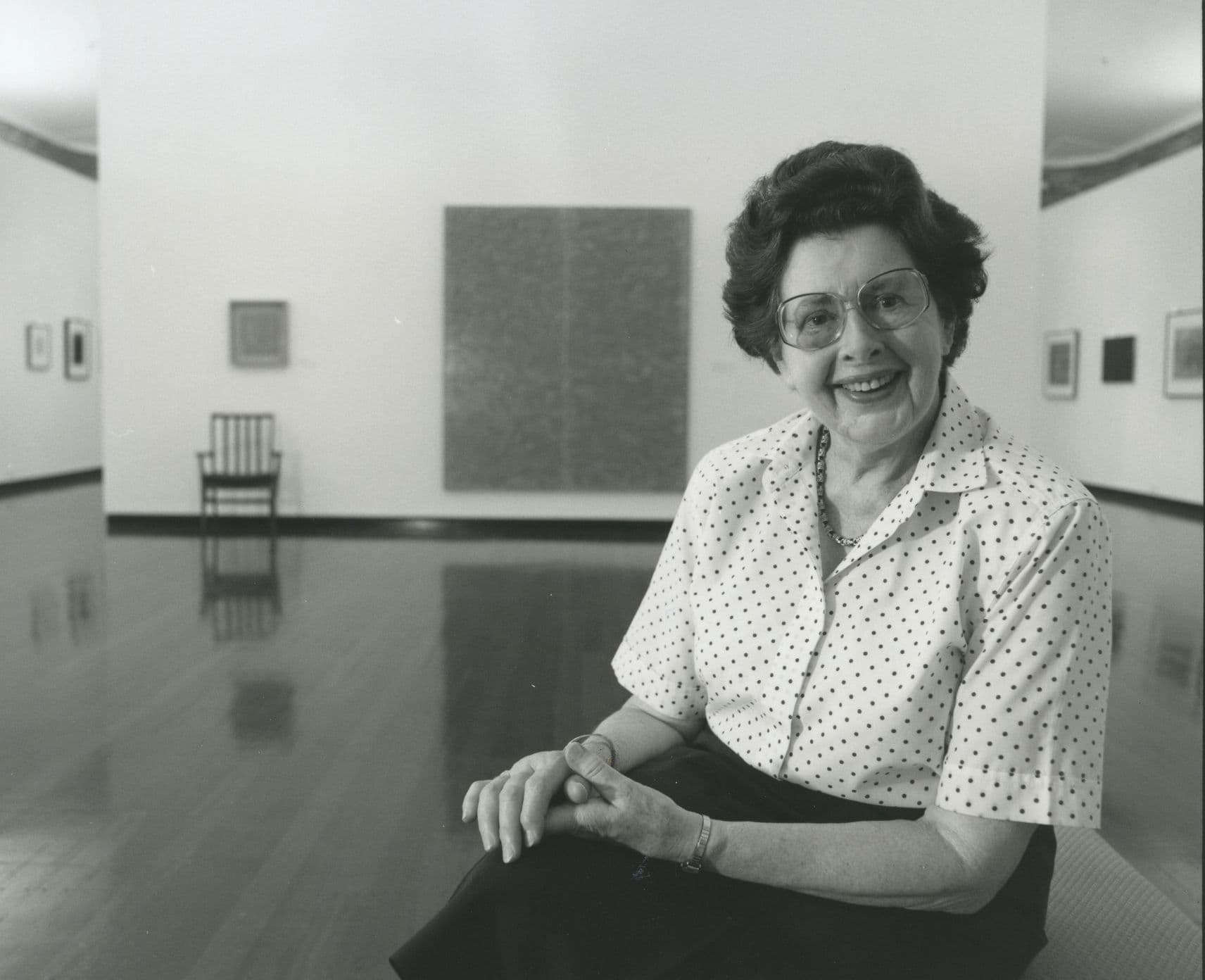 A black and white photo of Pauline Griffin at the ANU Drill Hall gallery