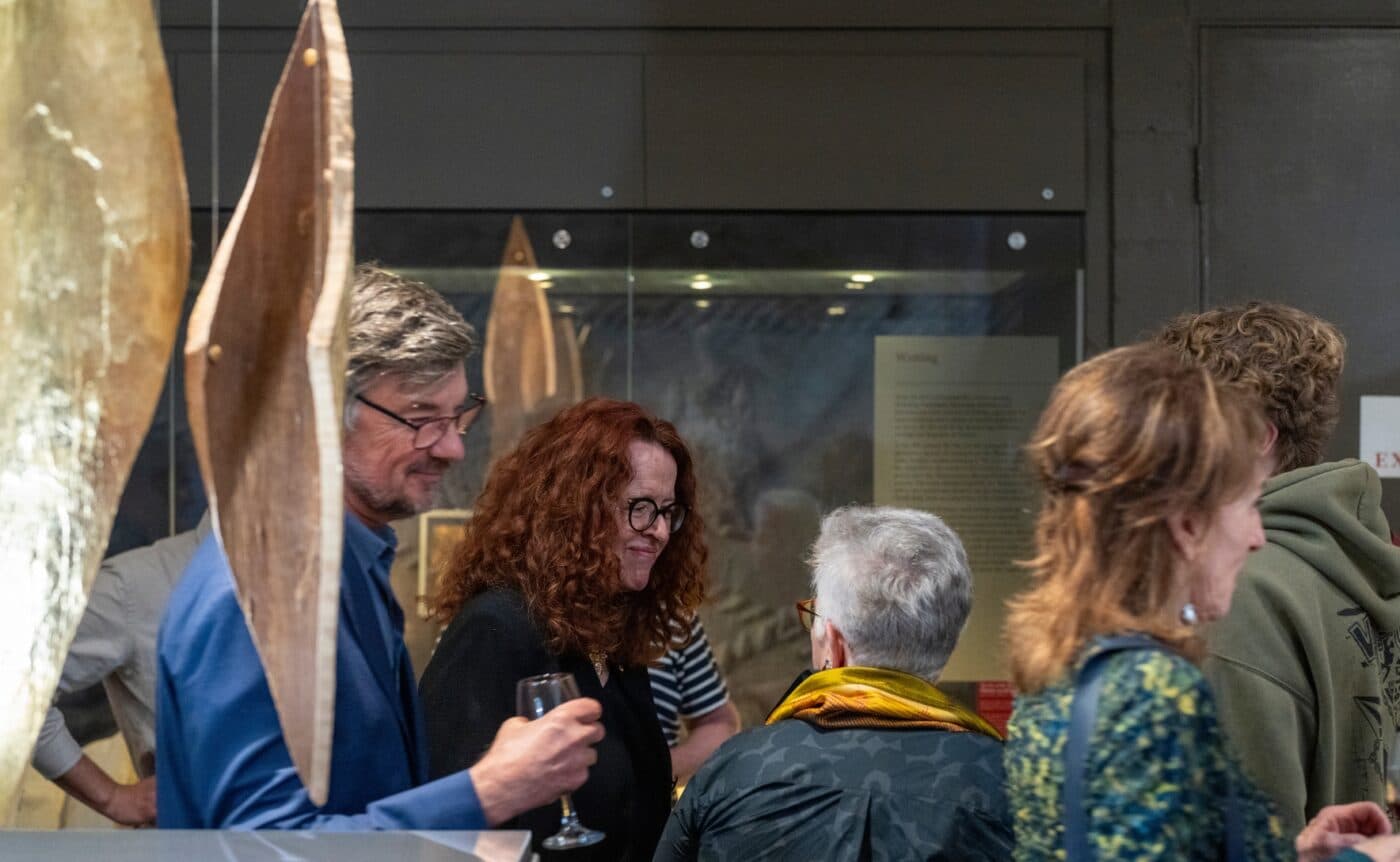 VC Genevieve Bell talks with museum patrons at ARTefacts opening night