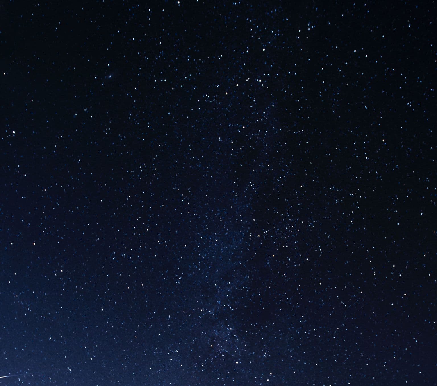 Black sky with lots of small white dots.