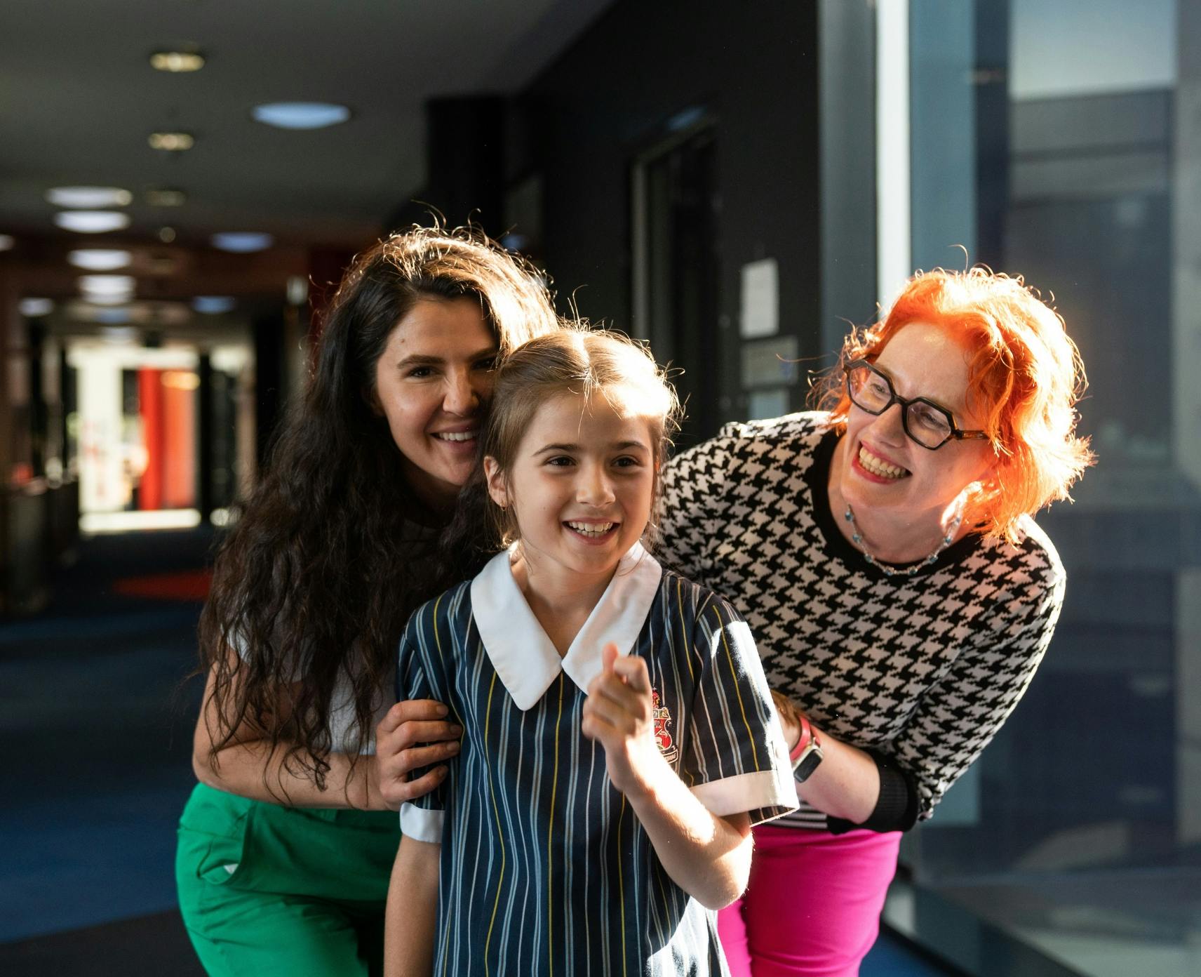 Zara Skepev with her mother Milena Skepev and Professor Leonie Quinn during a tour of the cancer research facilities at the ANU John Curtin School of Medical Research in 2022