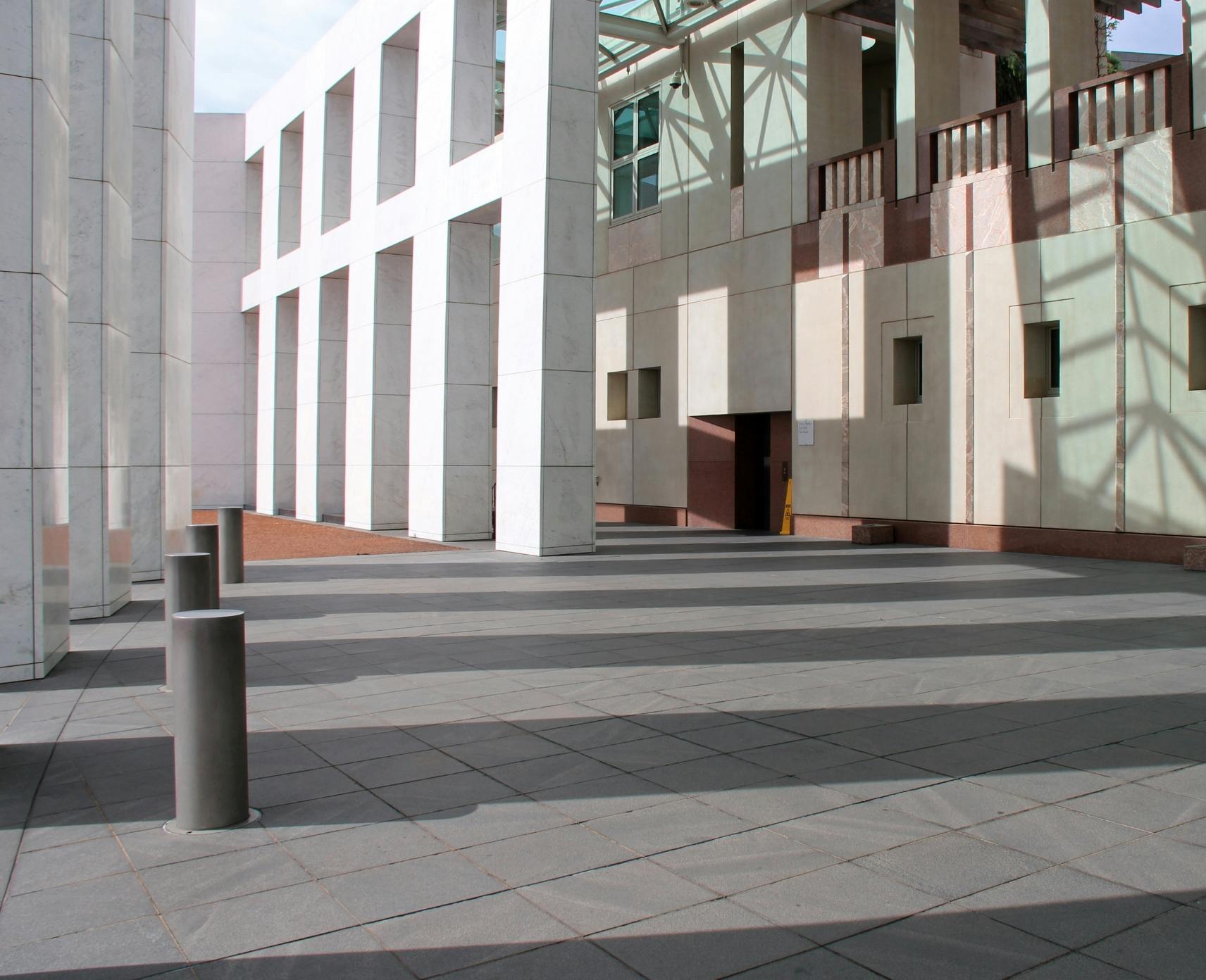 Front of parliament house with shadows