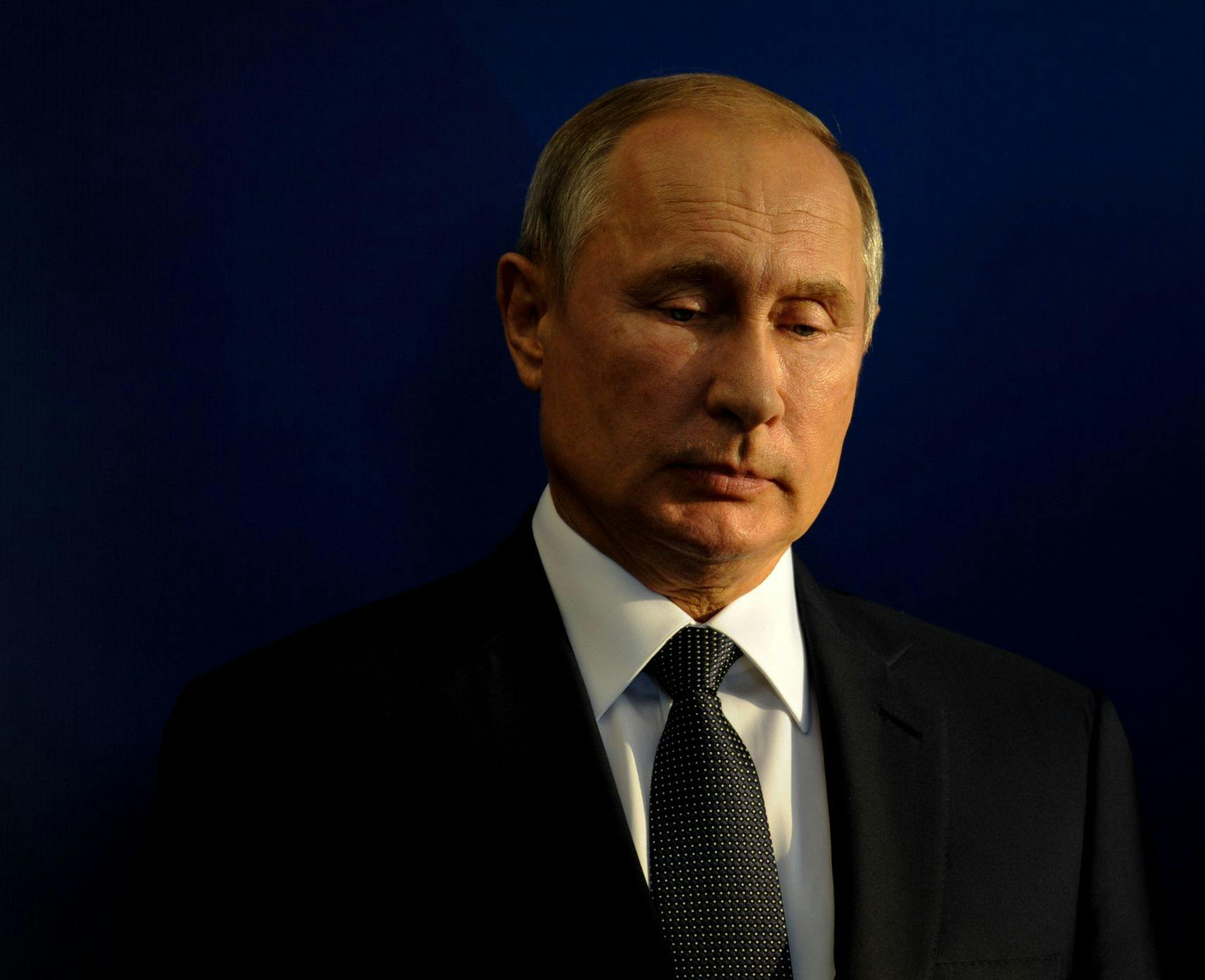 Russian President Vladimir Putin looking downcast